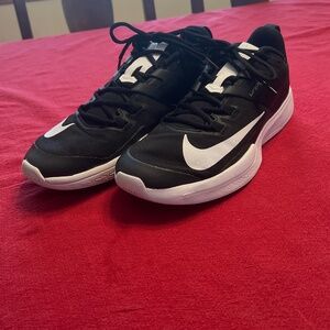 Black Nike Vapor tennis shoe